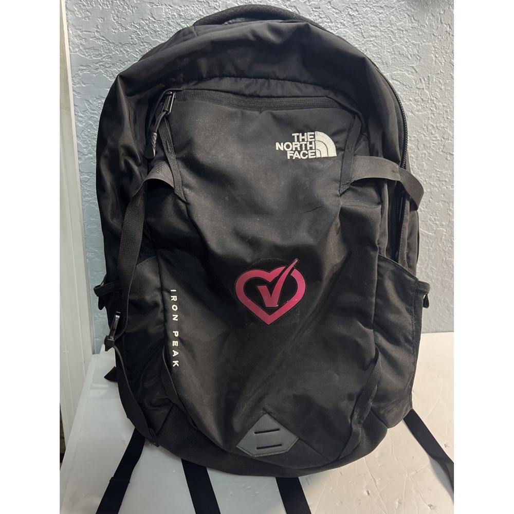 The North Face Black Backpack with Pink Heart Logo